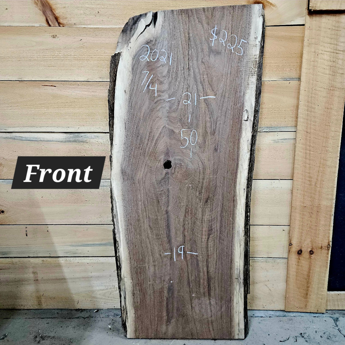 2021 Black Walnut live edge slab, 50 inches long by 19 to 21 inches wide by 7/4 inches thick