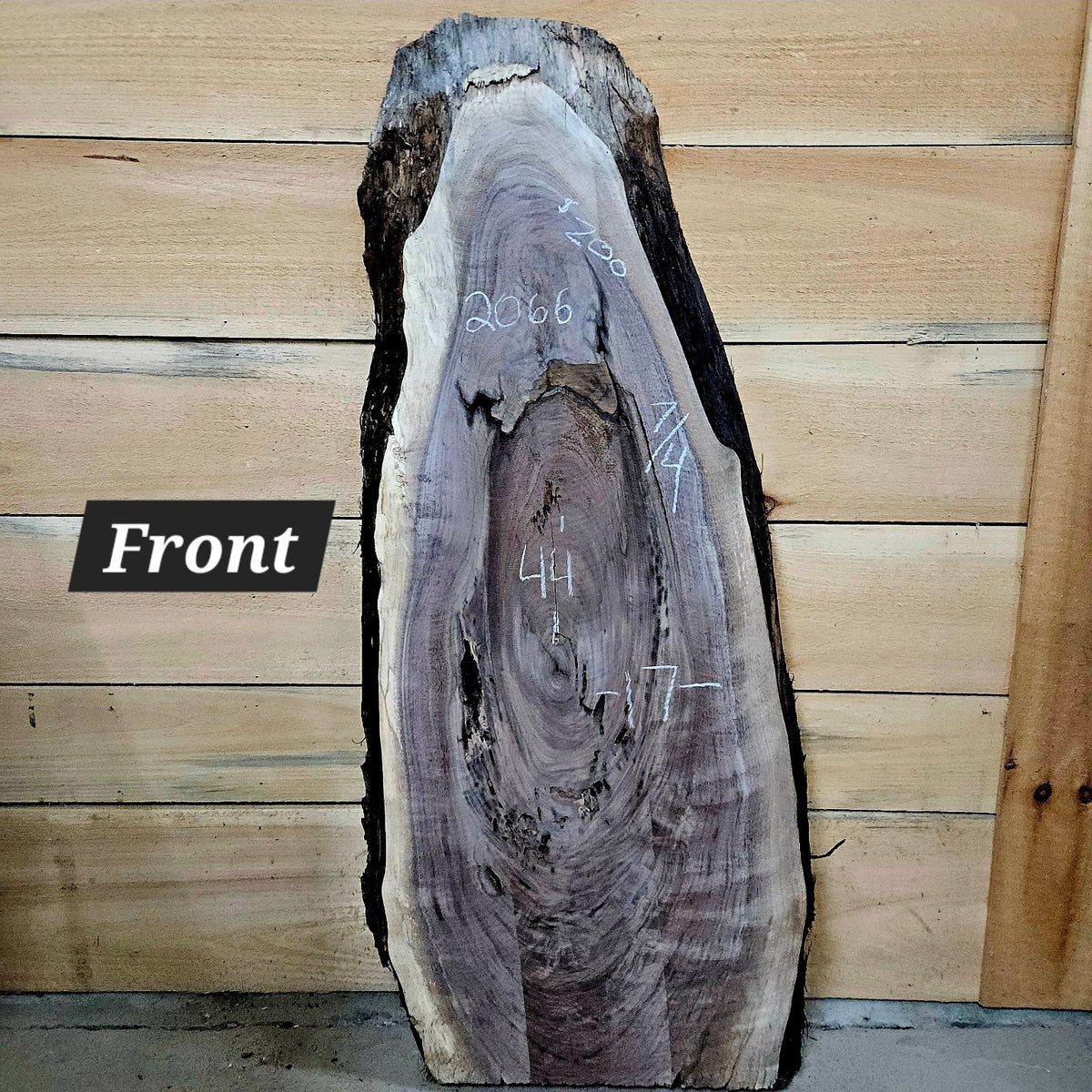 2066 walnut live edge slab front showing natural checks and voids